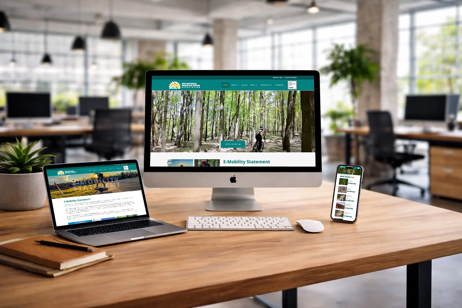 Mid-Michigan Mountain Biking Association website displayed on desktop, laptop, and mobile screens showing responsive layout.